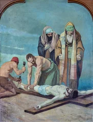 Poster SEBECHLEBY, SLOVAKIA - OKTOBERT 8, 2022: The painting  Jesus is nailed to the cross as part of Cross way stations in St. Michael parish church by unkonwn artist from beginn of 20. cent. © Renáta Sedmáková