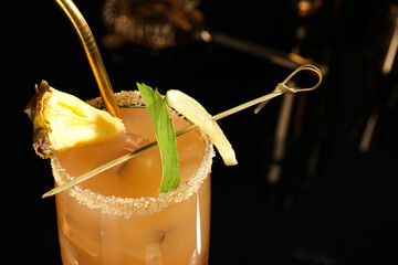 Tasty pineapple cocktail with mint and lime, closeup. Space for text