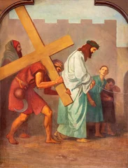 Poster SEBECHLEBY, SLOVAKIA - OKTOBERT 8, 2022: The painting Simon of Cyrene helps Jesus carry the cross  as part of Cross way stations in St. Michael parish church by unkonwn artist from beginn of 20. cent. © Renáta Sedmáková