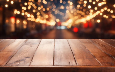The empty wooden table top with blur bokeh background