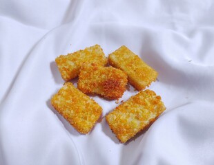 Chicken nuggets isolated on white background. Home produced nuggets