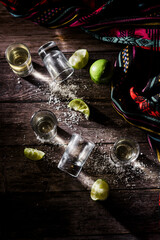 Tequila Shots with Lime and Salt for Mexican Party with Empty glasses in Mexico After Party	
