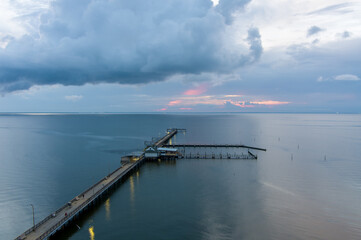 Aerial view of the Fairhope Pier at sunset