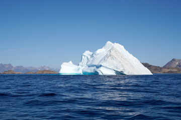 arctic iceberg floating on arctic ocean in Greenland © murattellioglu