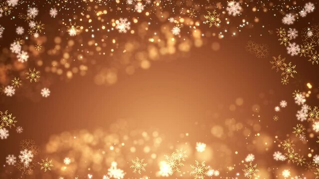 golden christmas background with stars. Christmas glittering glowing snowflakes particles and bokeh lights falling shiny background. New Years holidays winter frame concept with copy space for text.