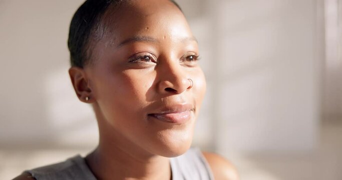 Black woman, calm and face with relax and smile for breathing and thinking of peace and freedom. Healing, wellness and person with zen, mindfulness and meditation in apartment in South Africa