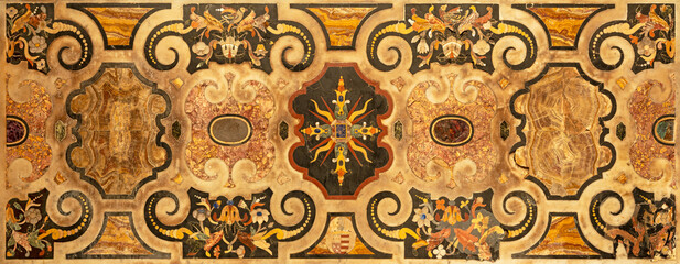 NAPLES, ITALY - APRIL 20, 2023: The stone mosaic (pietra dura)  on the side altar of church...