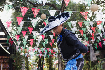 Latin man wearing as Traditional Mexican mariachi at parade or cultural Festival in Mexico Latin...