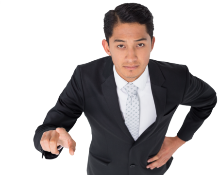 Digital png photo of asian businessman pointing with finger on transparent background