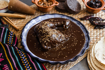 mole poblano is sauce with chicken mexican traditional food in Mexico Latin America