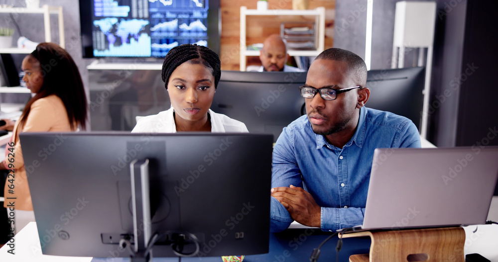 Poster african financial data analysts using dashboard on screens