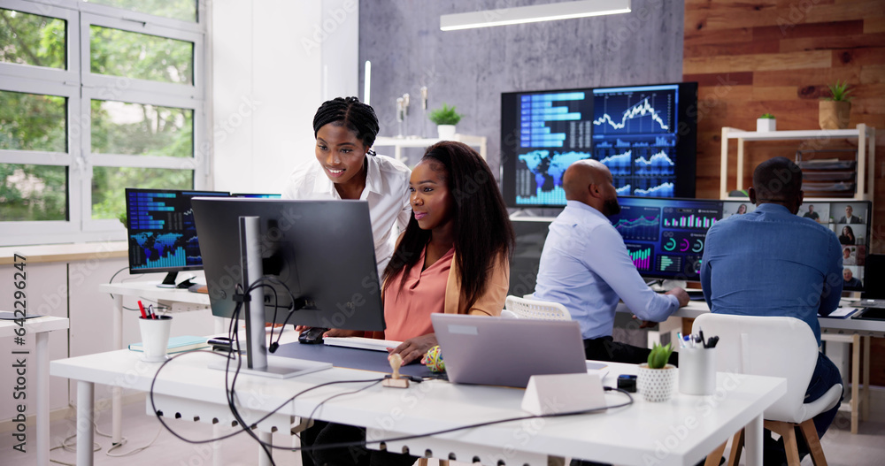Poster african financial data analysts using dashboard on screens