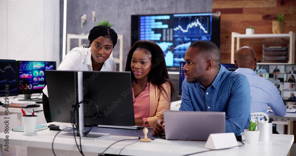Poster African Financial Data Analysts Using Dashboard On Screens
