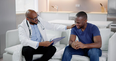 Doctor Talking With African Patient