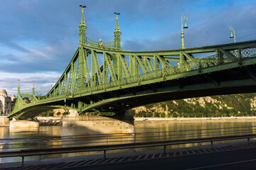 View of Szabadság Bridge from Favom Ter on Pest side across river Danube in Budapest, Hungary.