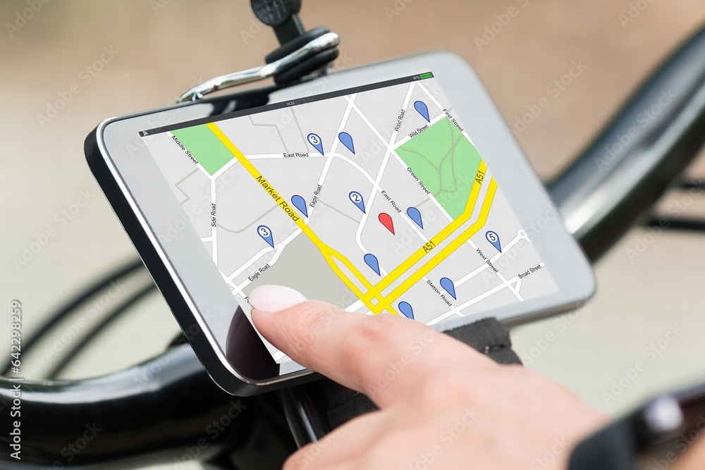Poster finger pointing at smart phone showing gps navigation