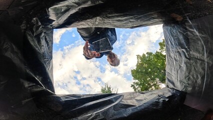 Man Throwing Away Smartphone