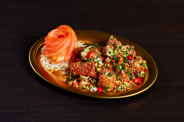 Roasted chilli and salt pork belly, serve on gold stainless dish