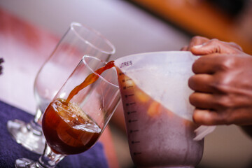 pouring coffee into a glass