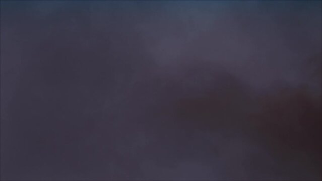 Lightning discharge and light effects in the clouds. Thunderclouds in bright flashes of lightning. Bad weather. Looped
