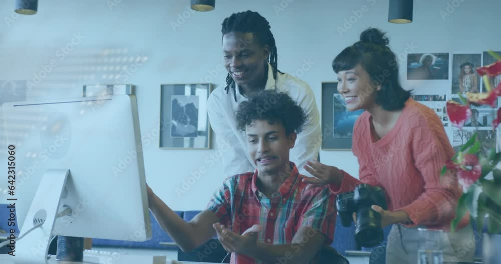 Poster animation of computer language and map over diverse coworkers sharing ideas on desk in office