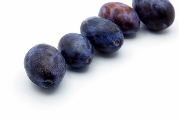 Group of plums  isolated on a white background. Fresh plum  isolated on white background.
