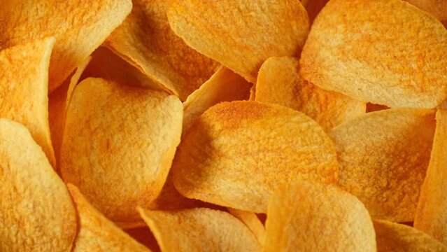 Zoom frame potato chips with paprika