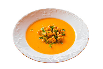 lentil soup in a white plate