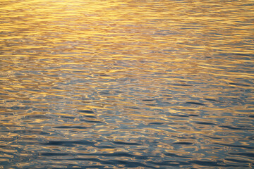 Sunny water colorful reflection. Abstract background nature wave composition.