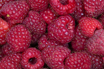 red raspberries textured background