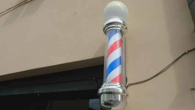 Barbershop sign. Close-up video. High quality 4k footage
