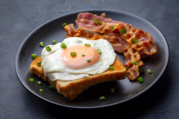 Fried eggs with bacon. Bacon and egg as English breakfast.