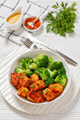 baked salmon bites with steamed broccoli florets