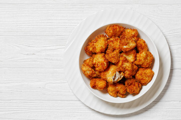 crispy fried panko breaded chicken bites in bowl