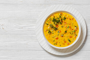 Beer cheese soup with vegetables and thyme