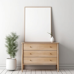 a large white frame on a chest of drawers against a gray wall frame for presentations