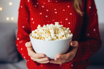 Woman with TV and Popcorn