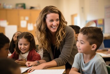 Fototapeta premium a woman with laptop looking at kids in a classroom