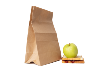 sandwich with peanut butter and raspberry jam with green apple and lunch bag isolated,classic american school lunch