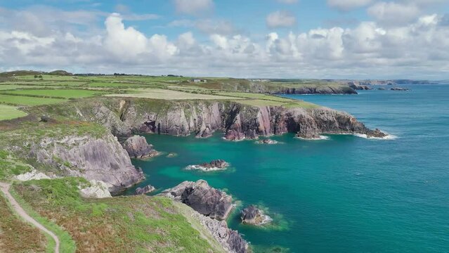 Cliffs and Fields over Porthclais from a drone, St Davids, Haverfordwest, Wales, England