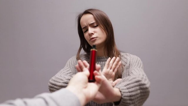 refuse vape smoking, stop electronic cigarette, teenager shows a sign of rejection of disposable ecigarette with her hand