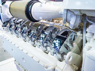 Marine diesel engine. White motor for ship. Internal combustion engine from speedboat. Marine motor...