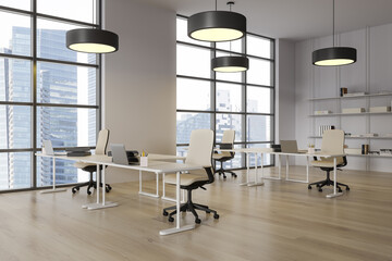 Modern office interior with workplace and laptop, panoramic window