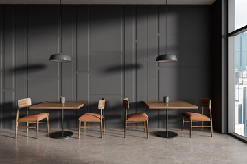 Grey cafeteria interior with chairs and table near window, eating space
