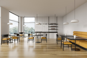 Stylish cafe interior with chairs and table, bar counter near panoramic window