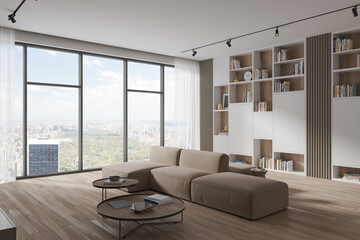 Stylish living room interior with couch and shelf with decor, panoramic window