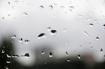 rain drop background. raindrop in autumn weather. rainy water surface on glass. wet rain drop background. droplet on window or condensation. water drop