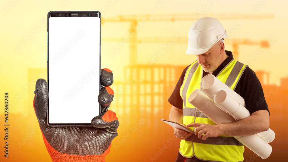 Aufkleber phone in builder hand. smartphone with blank screen. male engineer. guy is architect. phone mock up.