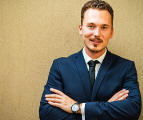 Portrait of an confident businessman looking at camera.