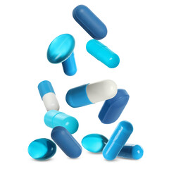 Many different pills falling on white background